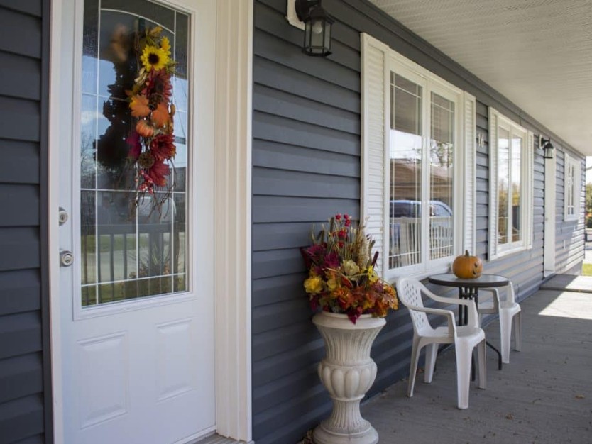 Professional installation of Royal and Gentek vinyl siding by Quality Contracting in Verner, Ontario, ensuring weather resistance and curb appeal.