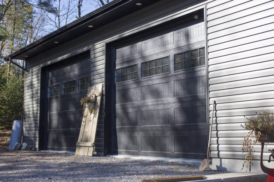 Royal Preferred Contractor installing premium vinyl siding, soffit, and fascia for a residential home in West Nipissing by Quality Contracting.