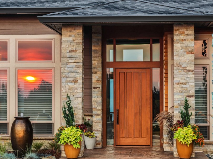 A fully renovated home in West Nipissing featuring new windows, doors, and siding installed simultaneously by Quality Contracting for maximum energy efficiency.
