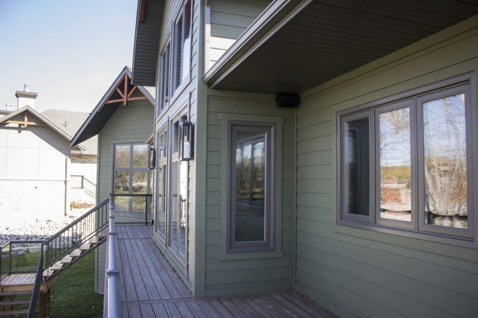Quality Contracting installing energy-efficient siding in Verner to reduce home heating and cooling costs.